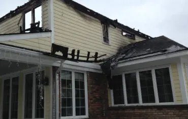 BEAR Fire-damaged house exterior